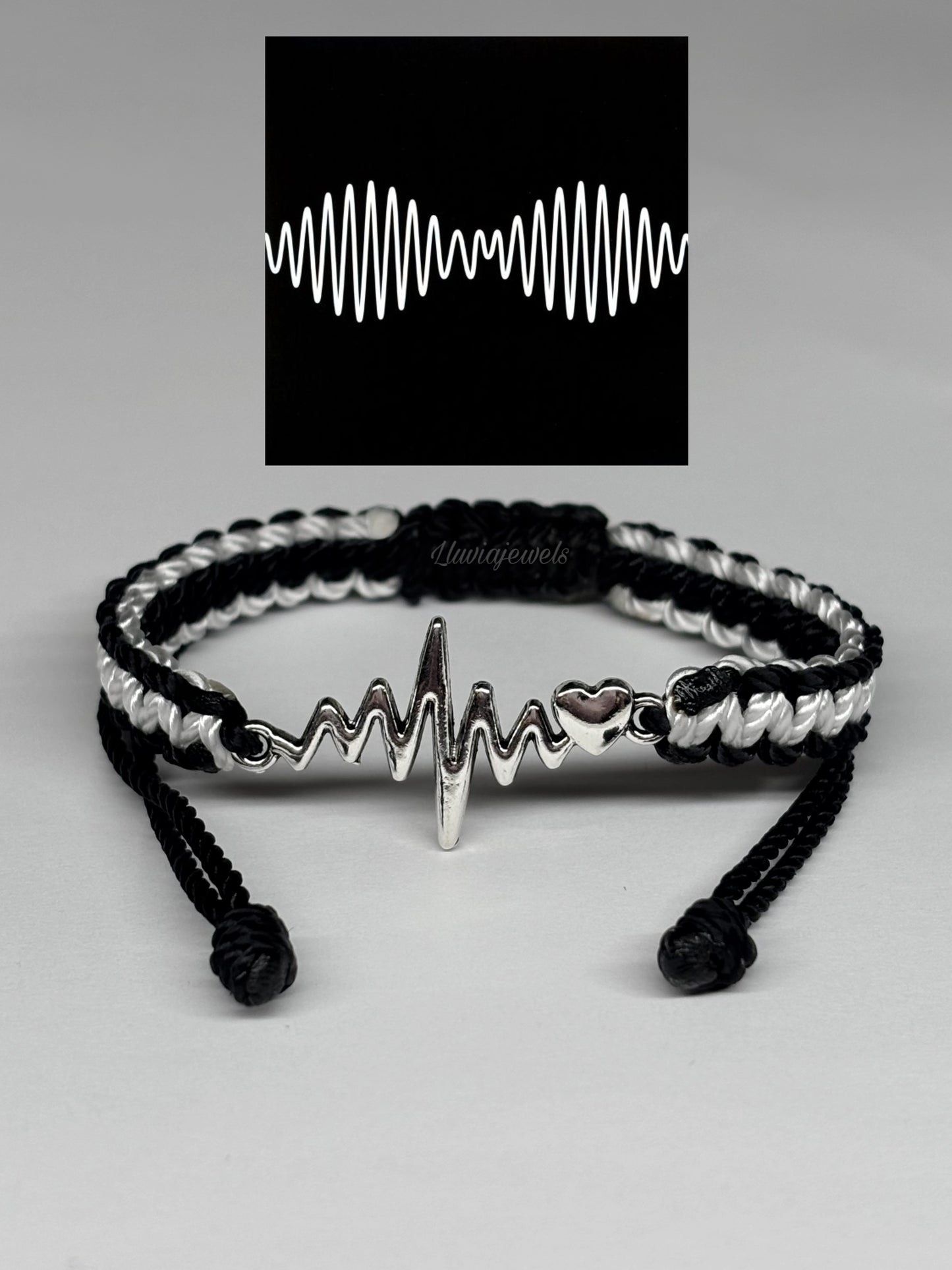 AM string bracelet